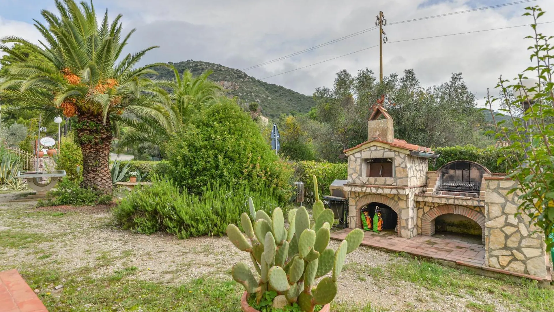Holiday home Bilocale Mimosa A Lacona Italy